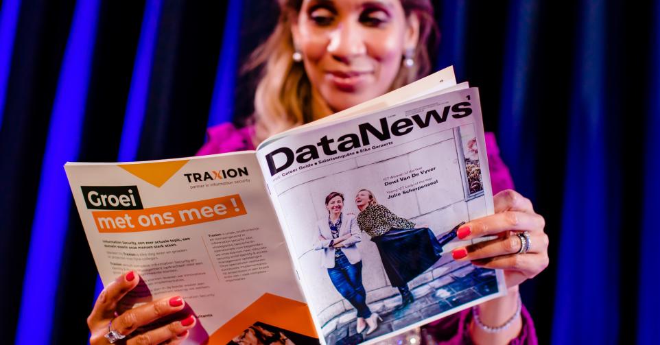 woman reading Data News folder
